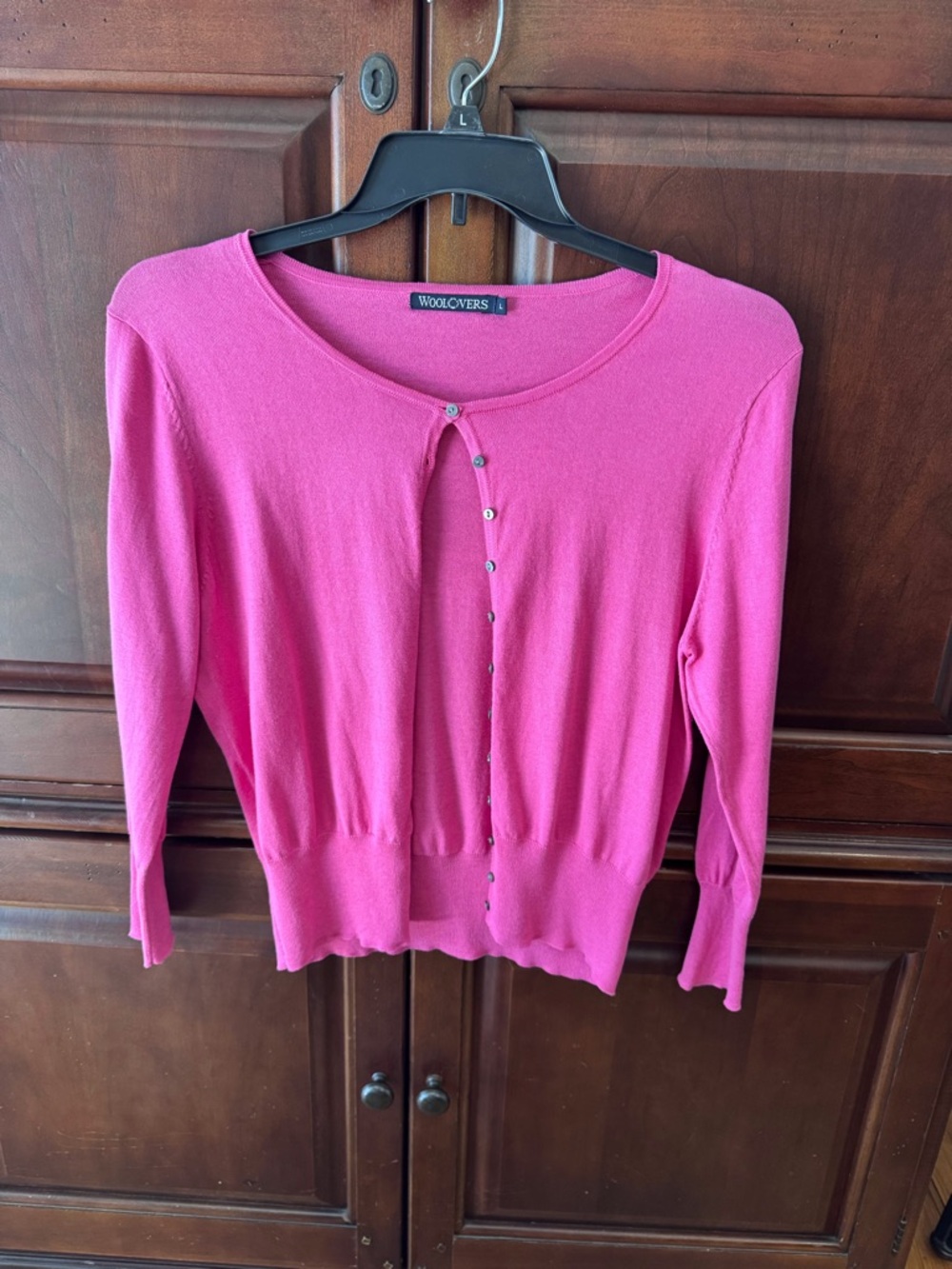 Great condition! Hot pink cardigan with lots of tiny buttons, size large